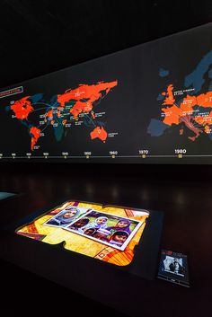 an interactive map on display in a dark room