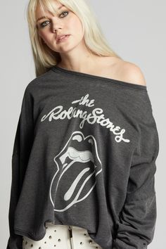 Add a touch of timeless rock 'n' roll flair with The Rolling Stones Classic Logo One Size Sweatshirt! This chic style highlights the band's name and their legendary tongue logo, blending effortless style with an iconic attitude. Made with soft vintage washed fabric, a relaxed crew neckline, ribbed hems, and our comfortable oversized fit. This style is one size only. Details Style #302803 Color: Vintage Black The Rolling Stones Classic Logo One Size Sweatshirt 50% Cotton 50% Polyester Care/Import Edgy Relaxed Fit Tops With Logo Print, Band Merch Tops With Logo Print, Band Merch Tops With Logo Print For Concert, Band Merch Concert Top With Screen Print, Band Merch Tops With Screen Print For Concerts, Band Merch Tops With Band Logo For Streetwear, Fall Band Merch Tops With Letter Print, Trendy Relaxed Fit Top For Concerts, Rock Style Crew Neck Top With Screen Print