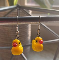 These mini resin duck earrings are made of resin and metal, sturdy and durable, lightweight and bright colored, Super Cute The wires are sterling plated and  hypoallergenic Size details: each duck pendant measures approx. 2 x 1.8 cm/ 0.78 x 0.7 inch Duck Earrings, Micro Pigs, Surf Jewelry, Moon Bracelet, Duck Cloth, Funky Earrings, Yellow Duck, Rubber Ducky, Bright Colored