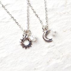 Sun and Moon necklace set. A silver plated sun and moon charm is accompanied by a natural crystal quartz bead. Hung on Sterling Silver chain.Chains pictured are 18 and 25 inches (45.7 and 63.5cm).Sun, moon and star charms measure 1/2 inch tall (12mm).Also available in gold: https://etsy.me/3e1RudZMore Best Friends necklaces: http://etsy.me/29jm5WK>>>Packaging<<>>Shipping Policy<<>>Good Vibes Refund Policy<<>>Repairs<<>>For International Cu Matching Sun And Moon Jewelry, Sterling Silver Celestial Pendant Charm Necklace, Mystical Sterling Silver Crystal Necklace With Moon Charm, Dainty Silver Crystal Necklaces As Gift, Spiritual Silver Jewelry With Moon Charm, Silver Spiritual Jewelry With Moon Charm, Silver Birthstone Jewelry For Friendship, Mystical Charms Jewelry For Gift, Silver Adjustable Necklace For Best Friend Gift