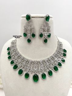 American Diamond Necklace Set/CZ Necklace/ Reception Jewelry/Statement Necklace Set/silver green     All items are shipped from Brampton, Ontario, Canada. If you need your item by a certain day, please reach out to us for express delivery option before placing the order so that we can update the shipping for you. Standard shipping/delivery timeline Below are the delivery timeline estimates once the order is shipped. ---> USA delivery timeline * 3-6 business days to major urban centers in USA. It Green Crystal Jewelry Sets With Sparkling Stones, Dazzling Green Emerald Necklace, Green Sparkling Stones Jewelry Sets For Wedding, Dazzling Green Diamond Necklaces, Dazzling Green Diamond Necklace, Dazzling Green Emerald Necklace For Anniversary, Formal Green Emerald Diamond Necklace, Green Sparkling Stones Jewelry For Anniversary, Green Crystal Jewelry Sets For Formal Occasions