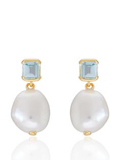 The Bella pearl earrings feature baroque pearl and step cut 'something blue' topaz, a staple in V jewellery and a nod to our Art Deco inspiration. The perfect bridal earrings that re-imagine classic vintage designs through a contemporary lens and can be worn effortlessly on your big day and beyond Made from 18 carat gold vermeil and set with a step cut blue topaz stone and baroque pearl. Please note as these earrings contain natural baroque pearls, the shape may differ slightly to those shown in the images provided. Height: Approx. 18mm. Width: Approx 8.5mm. Material: 18ct Gold Vermeil. Stone type and amount: Baroque Pearl & Blue Topaz. Bridal Earrings Blue, Something Blue Earrings, Blue Earrings Wedding, Baroque Pearls Jewelry, Art Deco Inspiration, Baroque Pearl Earrings, Blue Topaz Stone, Gold And Blue, Step Cut