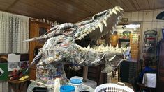 a large dragon statue sitting on top of a table