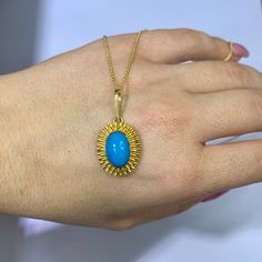 Metal: The Pendant Is 18kt Yellow Gold And The Chain Is 14kt Yellow Gold. Stone: Turquoise Shape: Oval-Shape Approximate Turquoise Measurements: 12 x 10 mm Weight of Pendant And Chain: 4.30 grams Measurements Of Pendant From Top To Bottom Including Bail: 32.00mm           Type of Chain: 1.00mm Diamond-cut Cable Chain Length of Chain: 18 Inches Type of Lock: Spring Clasp Luxury Yellow Gold Turquoise Necklace As Gift, Fine Jewelry Turquoise Gemstone Necklace In Yellow Gold, Fine Jewelry Turquoise Necklace In Yellow Gold, Luxury Turquoise Gemstone Necklace, Gold Turquoise Oval Necklace, Elegant Yellow Gold Turquoise Necklace With Cabochon, Luxury Turquoise Oval Necklace, Fine Jewelry Yellow Gold Turquoise Gemstone Necklace, Gold Oval Turquoise Gemstone Necklace