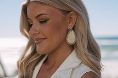 Elevate your summer style with our Straw Tear Dangle Earrings! These unique earrings feature a chic straw color block detail, adding a touch of natural elegance to any outfit. The tan base with a light grey outline adds a subtle pop of contrast, making these earrings the perfect statement piece. Natural Color Drop Earrings For Summer, Elegant Beige Earrings For Summer, Chic Beige Beach Jewelry, Chic Teardrop Jewelry For Summer, Chic Summer Teardrop Jewelry, Chic Spring Earrings For Vacation, Elegant Beige Earrings For Vacation, Chic Beige Earrings For Spring, Chic Spring Vacation Earrings