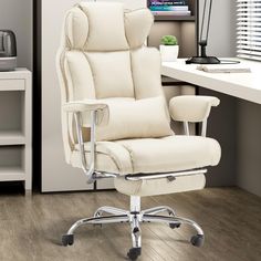 a white office chair sitting on top of a hard wood floor