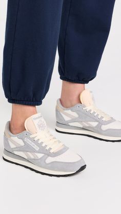 Upper: Cowhide suedeCushioned collar and mesh tongue Removable insoleLace-up closureRound toeRubber soleImported, VietnamThis item cannot be gift-boxedStyle #REBOK30463 Reebok Classic Leather Sneakers, Grey Moonstone, Reebok Classic Leather, Reebok Sneakers, Casual Sneakers Women, Reebok Shoes, Reebok Classic, Sneaker Collection, Sportswear Women