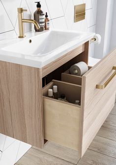 a bathroom sink with two drawers underneath it