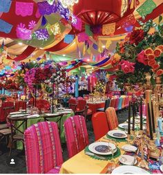 colorful tables and chairs are set up for an event