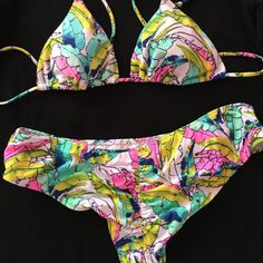 Victoria's Secret Triangle Bikini Top Ruched Bikini Bottom Set Brand New Without Tags. Never Worn. Tropical Palm Leaf Print With Bright Summer Colors. Size Small. Fully Lined, Top Has Removable Padding, Ties At Back, Halterneck Ties, All Over Cute Bright Tropical Palm Print. Smoke & Pet Free Home. Beachy Tropical Print Swimwear For Summer Parties, Tropical Printed Swimwear For Summer Parties, Summer Tropical Print Pink Tankini, Pink Triangle Top Printed Swimwear, Multicolor Swimwear For Summer Parties And Beach Season, Pink Printed Triangle Top Swimwear, Multicolor Beachy Swimwear For Summer Parties, Pink Tropical Print Swimwear For Vacation, Pink Tropical Print Swimwear For Sunbathing