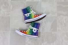 Women's High rise converse, hand dyed by me. Funkify your look with the standout Converse Chuck Taylor High Rise Casual Sneakers. The high-top chucks you know and love get even higher, for an edgy look you'll love. Supple canvas keeps feet comfy as you strut your fashion-forward stuff, while a reinforced rubber toe cap and vulcanized rubber sole keep you grounded. Plus, an ankle strap closure ensures these cuties go on easy. BENEFITS Quality vulcanized rubber sole Classic All Star ankle patch 10 High Rise Converse, Dyed Converse, Converse Haute, Rainbow Converse, Stars Converse, Custom Converse Shoes, Chuck Taylor Shoes, High Top Chucks, Custom Nike Shoes