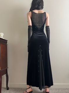 Rare vintage black velvet dress with mesh beaded inserts.  size XS Very good condition. Elegant Sequin Ballroom Dresses, Fitted Gothic Evening Dress For Formal Events, Elegant Black Ballroom Dresses, Black Velvet Evening Dress, Black Fitted Velvet Cocktail Dress, Black Velvet Dress For Gala, Elegant Black Velvet Dress For Gala, Black Velvet Evening Dress For Gala, Fitted Velvet Embellished Evening Dress