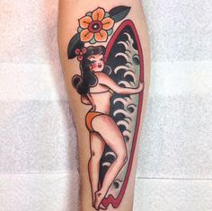 a woman with an umbrella and flowers on her leg