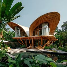 a large building with wooden roof next to trees and plants in the foreground, surrounded by greenery