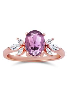 The immaculate vibes of our Contessa Ring are absolutely unmatched. ✨ The pristine and opulent amethyst crystal is framed by two delicate cubic zirconia blossoms in this delicate design. Delicate and regal, unique yet versatile, the Contessa Ring is a unique and stunning addition to any jewelry collection. 💜 Complete the look with our Tiara Stacker, Arc Stacker or Sweetheart Stacker! * * * Don't know your ring size? View our Ring Size Guide * * * …………………………………. RING SIZE & MATERIAL❋ 18k rose go Elegant Amethyst Wedding Ring With Vs Clarity, Elegant Amethyst Cluster Ring For Wedding, Rose Gold Amethyst Ring With Gemstone Accents For Anniversary, Rose Gold Gemstone Cluster Ring, Elegant Amethyst Crystal Ring With Center Stone, Crystal Amethyst Ring With Center Stone, Amethyst Crystal Ring With Center Stone, Rose Gold Amethyst Crystal Ring With Gemstone, Elegant Lavender Birthstone Ring With Center Stone