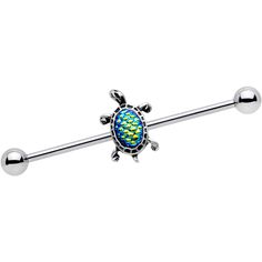 a blue and yellow turtle belly button bar with two balls on the end is shown