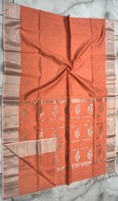 *It's a beautiful  Maheshwari Handwoven big motif saree. *100% Handloom : comes with India Handloom Mark *Washing Method : Dry Clean Recommended *Weave Type: Maheshwari *Material: Half Silk & Half Cotton *Length: Saree: 5.5 metres *Blouse Piece: 0.80 metres *Width : 46 Inches* Please note - color may be vary a little due to sunlight and photography . Please message us after purchasing in case you want fall and Pico done it not . No extra charges for fall and Pico but inform us . Blouse stitching Motif Slub Silk Saree For Puja, Orange Tussar Silk Saree With Zari Weaving, Traditional Orange Slub Silk Dupatta, Slub Silk Saree With Motifs For Puja, Orange Tussar Silk Saree With Dupatta, Diwali Orange Slub Silk Saree, Orange Self-design Tussar Silk Dupatta, Unstitched Orange Cotton Silk Dupatta, Orange Tussar Silk Self-design Dupatta