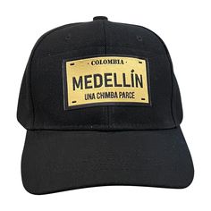 PRICES MAY VARY. Colombian Pride: Show your love for Medellin, Colombia with this classic baseball cap featuring the iconic "UNA CHIMBA PARCE" logo embroidered in gold. Universal Fit: The adjustable strap allows you to find the perfect fit whether you have a small or large head. Comfortable for all. Durable Design: Made from breathable cotton twill, this cap is built to last through years of wear while keeping you cool and comfortable. Great Gift Idea: For those who love MEDELLIN or all things C Gold Caps, Baseball Caps, Logo Embroidered, Running Errands, Cotton Twill, Classic Black, Baseball Cap, Caps Hats, Classic Style