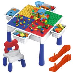 a child's table and chair with legos on it, all in different colors