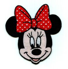 a minnie mouse patch with a red bow on it's head and polka dots