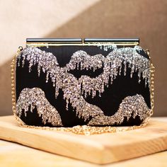 Enhance your formal look with our stunning black clutch purse, adorned with striking silver details, ideal for weddings or elegant affairs. A perfect blend of style and functionality, this versatile evening bag is a thoughtful bridesmaid gift or a charming birthday surprise for her.  It can easily fit most size cellphones and few personal items. ✅ SPECIFICATIONS:  Size : 8 inches x 5 inches ⦿ Item Type: Embroidered Clutch ⦿ Material: Sequins. ⦿ Style: Minimalist ⦿ Item made: Handmade  ✅ FEATURES Black Rectangular Bag For Gala, Black Rectangular Gala Bag, Silver Glamorous Evening Bag For Party, Elegant Black Clutch For Gala, Chic Black Evening Bag For Gala, Glamorous Wedding Clutch For Party Season, Black Rectangular Evening Bag For Party, Black Rectangular Evening Bag For Gala, Glamorous Clutch Evening Bag For Party Season