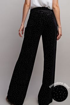 Rhinestone Velvet Wide Leg Pants Brand: EE:SOME Style: PK9053 Fabric: 100% POLYESTER Details: Velvet pants featuring rhinestone detailing throughout, a side zipper closure and is a straight leg style. **MATCHING BLAZER STYLE # JK9596 ** Black Embellished Wide Leg Bottoms, Glamorous Evening Pants With Rhinestones, Elegant Rhinestone Bottoms For Night Out, Embellished Straight Leg Evening Bottoms, Velvet Wide Leg Pants For Party, Velvet Wide Leg Full Length Party Pants, Glamorous Embellished Wide Leg Pants, Velvet Full Length Wide Leg Party Pants, Black Velvet Pants For Party