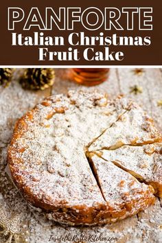 an italian christmas fruit cake with powdered sugar on top