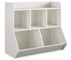 a white book shelf with four compartments