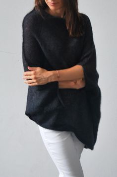 "Black mohair silk sweater, black mohair silk pullover, soft warm mohair silk cardigan, black hand knitted mohair poncho, soft mohair sweater So comfy, fuss free and great for layering. Balance the dramatic draping with leggings or your favourite skinny jeans. Go for a casual, lived in feel or dress it up for a dramatic evening look, depending on your mood. Can be worn open or belted. Will work well for maternity wear as well. Light weight jersey knit. Content + Care - 75% mohair, 25 % silk - Ha Knitting Fashion, Silk Sweater, Silk Cardigan, Navy Sweater, Soft Cardigan, Mohair Sweater, Cardigan Black, Oversized Cardigan, Black Hand