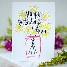 a happy birthday card with flowers in a mason jar and the words happy birthday mum written on it