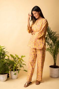 Hand stitched collection of soft  and comfortable pyjama's made  of pure cotton fabric  sourced from Jaipur, India with block print designs .  The Apparels are designed by  two women entrepreneurs  who believe that that all women were created infinitely beautiful and they with their  versatile creations sprinkle a little Star dust.  These light weight cotton  Pajama sets are  lounging must haves giving  you a warm ,cosy and comfortable feel. Sizes -    Inches XS   Bust            41 Yellow Cotton Sets With Printed Motifs, Yellow Cotton Block Print Sets, Traditional Yellow Cotton Pant Set, Yellow Relaxed Fit Cotton Sets, Cotton Block Print Sets For Pajama Party, Block Print Designs, Pyjama Sets, Comfortable Pajamas, Cotton Pajama Sets