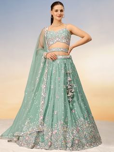 Elevate your ethnic style with our beautiful sea green sequins chiffon reception wear lehenga choli. This stunning outfit features intricate sequin and coding thread embroidered work that adds a touch of elegance and sophistication to your look.
The sea green color exudes a sense of serenity and freshness, making it perfect for festive occasions or casual events where you want to stand out.
The lehenga is semi-stitched up to 42 inches with a 3.0-meter flair, allowing for a comfortable and flatte Indian Outfit For Wedding, Jade Lehenga, Chiffon Lehenga, Bridesmaids Lehenga, Partywear Lehenga, Outfit For Wedding, Latest Lehenga Choli, Princess Cut Blouse, Sari Lehenga