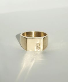 Men's Square Signet Ring Hallmarked Engagement and Wedding Jewelry by Macha Studio Brooklyn NYC Classic Rectangular Signet Ring With Initials, Timeless Gold Signet Ring With Hallmarks, Timeless Gold Signet Ring For Promise, Symbolic Hallmarked Signet Ring For Formal Occasions, Symbolic Formal Signet Ring Hallmarked, Formal Symbolic Hallmarked Signet Ring, Symbolic Signet Ring With Engraving For Promise, Timeless Yellow Gold Signet Ring With Hallmarks, Yellow Gold Engraved Initial Ring For Promise