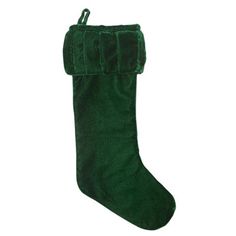 a green christmas stocking on a white background