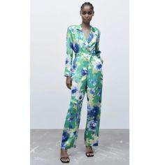 New With Tags Zara Floral Print Long Sleeved Multicolored Jumpsuit| 8676/274/330 Size Xs Lapel Collar Surplice V-Neckline Long Sleeves Shoulder Pads Straight Leg Front Zip And Golden Button Closure Side Slant Pockets 100% Polyester Approximate Measurements: Armpit To Armpit - 18” Waist - 13” Rise - 11.5” Inseam - 30” Length - 57.5” Leg Opening -9.25” 19-000 Zara Green V-neck Jumpsuits And Rompers, Casual Green Pantsuit For Spring, Zara Casual Floral Print Jumpsuits And Rompers, Multicolor Jumpsuits And Rompers For Spring Workwear, Floral Print Jumpsuits And Rompers For Spring Workwear, Spring Zara Long Sleeve Pantsuit, Zara Long Sleeve Pantsuit For Spring, Spring Zara Pantsuit With Long Sleeves, Zara Fitted Jumpsuits And Rompers With Floral Print