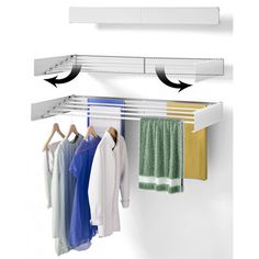 an image of clothes hanging on the rail in front of a wall mounted rack with hooks