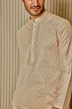 Beige tussar silk kurta with tonal resham, lurex, zari, and sequin embroidery in floral jaal patterns. Comes with pyjama. - Aza Fashions Embroidered Slub Silk Sherwani For Eid, Eid Embroidered Slub Silk Sherwani, Designer Embroidered Slub Silk Sherwani, Festive Cotton Silk Bandhgala With Resham Embroidery, Festive Kurta With Resham Embroidery On Tissue Silk, Transitional Tissue Silk Kurta With Zari Work, Festive Tissue Silk Kurta With Zari Work, Designer Embroidered Kurta For Diwali, Festival Sherwani With Resham Embroidery In Slub Silk