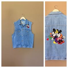 "Awesome 90's Mickey Mouse denim vest. Vest is in great & clean condition with little signs of previous wear. Perfectly worn in with naturally distressed denim character. Traditional Mickey Mouse embroidered emblems on front and back. Embroidery in great shape. Full button up front with adjustable buttons in back. Lightweight denim 100% cotton. See photos for details. Measurements (taken zipped-buttoned up and laid comfortably flat) x2 for total circumference (inches) Size Medium Shoulders 1 90s Style Spring Denim Jacket, Retro Denim Vest For Fall, Retro Cotton Denim Vest For Spring, Retro Spring Denim Vest, 90s Denim Vest For Fall, Retro Denim Vest For Spring, 90s Style Medium Wash Denim Vest For Spring, Blue Denim Vest For Spring In 90s Style, Retro Cotton Denim Vest