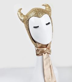 The headpiece features gold seguin fabric and playful horns, making it a perfect addition to any costume.  One size fits most, head circumference- 22-23 inches.  Lightweight and comfortable to wear all night long. The bonnet is completely lines and has long ties, which you can tie into a bow, leave hanging like a scarf, or style however you like. Fits a variety of Halloween and Cosplay costumes. Pair it with your evening outfit and turn it into a Halloween or party costume with just one headpiece. This headpiece will add style and shine to your costume, ensuring you're the center of attention! Welcome custom orders, I love it, please message me. Horn Cosplay, Devil Woman, Party Horns, Evening Outfit, Evening Outfits, Head Circumference, Party Hats, Costume Party, Cosplay Costume