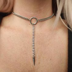 Stunning trendy yet sophisticated O ring chain choker with spike pendant! Made from stainless steel so will not tarnish or discolour. Available in 2 sizes: Small (shown in photographs) Measures 12.5 inches (choker part)+ 3 inch extension chain  Medium  Measures 14.5 inches (choker part)+ 3 inch extension chain  Width of chain: 5mm O ring measures 18mm Spike pendant measures 18mm Please don't hesitate to contact me if you would like a larger size. 💕 You will receive this necklace gift wrapped re Punk Style Stainless Steel Metal Ring Jewelry, Punk Stainless Steel Jewelry With Metal Ring, Punk Jewelry With Adjustable Stainless Steel Chain, Punk Style Stainless Steel Jewelry With Adjustable Chain, Punk Stainless Steel Jewelry With Adjustable Chain, Punk Stainless Steel Choker, Punk Stainless Steel Choker Jewelry, Edgy Stainless Steel Choker Necklace, Punk Style Stainless Steel Clavicle Chain Jewelry