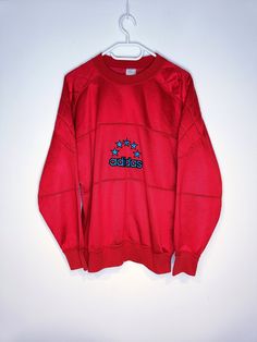 Condition 9/10 Length 71cm Width 58cm 90s Style Red Tops For Winter, 90s Style Red Sweatshirt For Winter, Red 90s Style Winter Tops, 90s Style Red Sweatshirt With Letter Print, 90s Style Red Letter Print Sweatshirt, Oversized 90s Red Top, 90s Red Sweatshirt For Winter, Red Oversized 90s Tops, Retro Red Sweatshirt For Streetwear