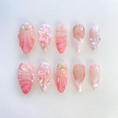 fall nails,fake nails,presson nails,kawaii nails,gyaru nails,glue on nails,false nails,cute nails,christmas nails,chrome nails,Stiletto Nail,Princess nails,Fairy Nails, Elegant nails,Trendy nails 🌸About the product  1.Each set include 10 nails of 100% handmade  2. Cuticle stick 3. Nail file 4. Jelly glue set 5. Packaging storage box 🌸Material: Acrylic 🌸How to measure the size？ 1. Measure the bare nails without nail polish 2. Use a tape measure to measure the widest part of the nail 3. Align the scale to the left edge of the nail, close to the curvature of the nail arc 4. Align the scale to the right edge of the nail, close to the curvature of the nail arc, and you can get the size 🌸About use 1. The glue can last for 1-2 weeks and cannot be reused 2. The jelly glue can last for 2-3 days Kawaii Christmas Nails, Pink Cute Nails, Birthday Nails Pink, Nails Gyaru, Nails Long Almond, Gyaru Nails, Nails Star, Shell Nails, Fairy Nails