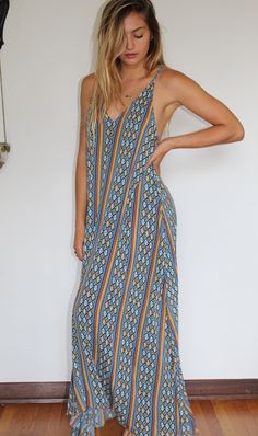 Our versatile Sun Dress is many looks in one: full coverage dress, a halter, cover up, you name it! Adjustable back ties allow you maximum versatility for the neckline and length. Flowing fabric gives freedom of movement, lets you experience the air and just feels so nice as you go about your day. Super easy beach cover up for a casual lunch date, post-sun glow, or dress it up with a light, long-length sweater or kimono for the office. You can also love to roll this piece up and tuck it into you Beach Cover-up Maxi Length Halter Sundress, Blue Halter Neck Maxi Dress For Beach, Bohemian Sundress With Spaghetti Straps For Poolside, Bohemian Halter Neck Maxi Dress For Poolside, Bohemian Halter Neck Midi Dress Beach Cover-up, Bohemian Halter Neck Midi Dress For Beach, Bohemian Tie-back Halter Dress For Beach Season, Bohemian Tie Back Halter Dress For Beach Season, Bohemian Backless Beach Dress For Poolside