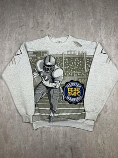 This vintage Webster Warriors High School football crewneck sweatshirt is an all-over print design in men's size L. It's a classic and comfortable piece, perfect for fans or alumni. Please refer to the provided pictures for a detailed view of the condition and measurements of this item. We strive to present our pieces as accurately as possible, ensuring you have a clear understanding of their fit and wear. We put in our best efforts to clean and remove any stains, marks, etc. from our vintage pieces, but due to the nature of these items, some imperfections may remain. If you have any questions or require additional pictures, please don't hesitate to reach out to us! Football Crewneck, Balenciaga Shirt, High School Football, Mens Hoodies, School Football, Sweatshirt Crewneck, Mens Sweatshirts Hoodie, Crewneck Sweatshirt, Sweat Shirt