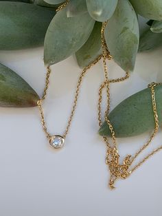 "Diamond Solitaire Necklace in 14k Yellow Gold Metal--14k Yellow Gold ( solid gold ) --Bezel setting --Diamond weight---0.20CT --Diamond Color----G --Diamond quality---SI1 NATURAL DIAMOND Available in Rose Gold too Necklace is 18\" , we can add a loop to make it adjustable to 16\"" Gold Birthstone Necklace With Bezel Setting, Gold Round Cut Birthstone Necklace In Fine Jewelry Style, Gold Round Cut Birthstone Necklace Fine Jewelry, Gold Round Cut Birthstone Necklace, Gold Jewelry With Smooth Bezel As Gift, Gold Solitaire Necklace With Oval Pendant For Gift, Classic Gold Birthstone Necklace With Round Stone, Fine Jewelry Anniversary Necklace With Smooth Bezel, Fine Jewelry Necklace With Smooth Bezel Round Pendant