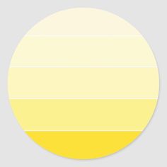 a yellow and white striped round sticker