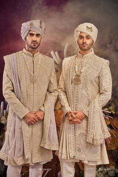 Make a grand statement on your special day with a luxurious Sherwani crafted from premium fabrics (like silk, brocade, or georgette) for ultimate comfort and sophistication. Our collection boasts a variety of designs to suit every taste: Classic elegance: Opt for a timeless Sherwani with intricate embroidery on the collar or cuffs. Modern flair: Go for a Sherwani with a unique neckline or a trendy color palette. Regal opulence: Choose a Sherwani with rich embellishments like zardozi work for a t Luxury Georgette Sherwani With Intricate Embroidery, Formal Naqshi Lehenga With Traditional Drape, Festive Formal Lehenga With Naqshi Detailing, Formal Lehenga With Naqshi In Traditional Drape, Festive Formal Lehenga With Naqshi, Ceremonial Brocade Sherwani With Intricate Embroidery, Brocade Sherwani With Traditional Drape For Weddings, Ceremonial Sherwani With Intricate Embroidery In Brocade, Wedding Sherwani In Brocade With Traditional Drape