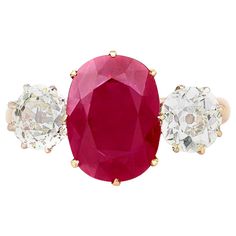 Estate ring finely crafted in 18K yellow gold features an oval shaped 3.00 carat Burma Ruby. The center stone is flanked by two round brilliant cut diamonds, weighing a total of 2.25 carat. Circa 1950's. Diamond Rings With Price, Estate Ring, Ruby And Diamond Ring, Ruby Diamond Rings, Diamond Cocktail Rings, Gold Ring Sets, Ring Crafts, European Cut Diamonds, Domed Ring