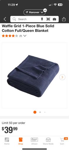 a blue blanket is on sale in the store