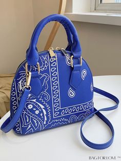 BagForLove - Paisley Print Dome Handbag Product Description Color Royal Blue Details Jacquard Magnetic No Type Dome Bag Bag Size Small Strap Type Adjustable Pattern Type Colorblock Style Elegant Closure Type Zipper Features Lightweight Composition 100% Polyurethane Material PU Leather Size Chart INCH CM Strap Length Bag Length Bag Width Bag Height Handle Height 51.2 inch 8.7 inch 3.5 inch 7.5 inch 2.8 inch Strap Length Bag Length Bag Width Bag Height Handle Height 130 cm 22 cm 9 cm 19 cm 7 cm Details Pictures Similar Products h2 { text-align: center; } /* æ¢è¡ */ li{ white-space: normal; word-break: break-all; word-wrap: break-word; } .red-box { width: 100%; display: flex; flex-direction: row; flex-wrap: wrap; justify-content: center; } .red-box > div { width: 190px; height: 250px; margi Everyday Use Bags With Paisley Print, Dome Bag, Red Satchel, Soft Leather Handbags, Cloud Bag, Canvas Messenger Bag, Travel Workout, Cross Bag, Celine Luggage Bag